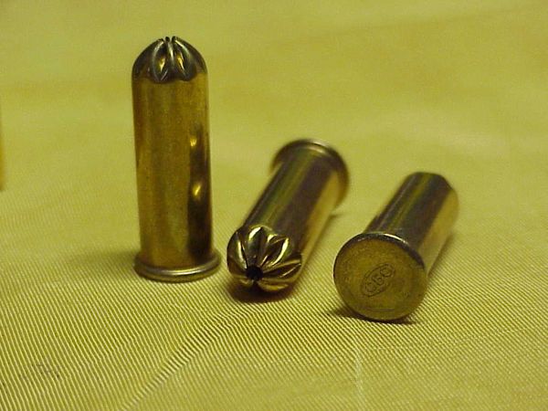 A photo of the .310 Remington Skeet, displaying the crimped cartridge, as well as the CBC headstamp and so on.