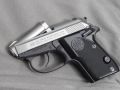 Tip-Up-Barrel-Pistol-Handgun-Beretta-Model-3032-Tomcat-32-ACP-Firearm-Wiki.jpg